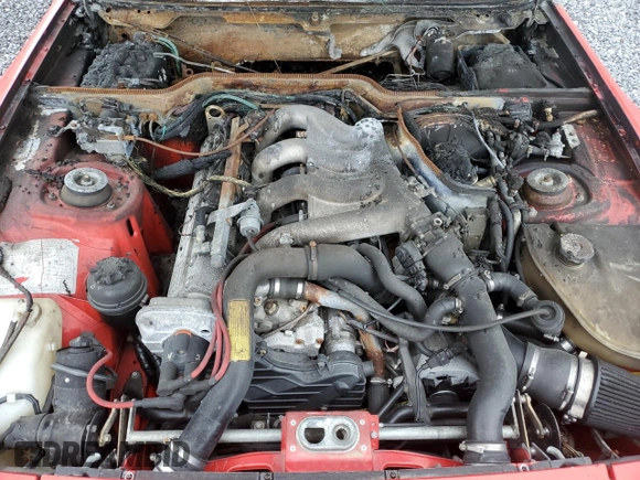 1986 Porsche 944 z VIN WP0AA0958GN152718, wystawiony jako Copart lot #55963875 z przebiegiem Nie podano mil oraz Szkoda całkowita • Salvage title. Historia ofert i sprzedaży dostępna na DreamBid. Obrazek 11.
