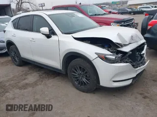 2021 Mazda CX-5 Touring with VIN JM3KFACM0M0412718, listed as a IAAI auction lot 41486753 with 41,496 mi miles. Bid and sale history available at carsss.com. Image 1.