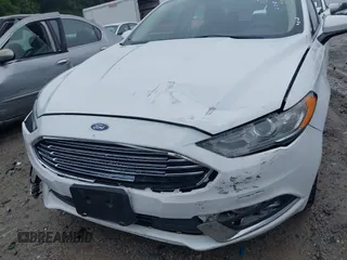 2018 Ford Fusion SE with VIN 3FA6P0HD6JR153230, listed as a IAAI auction lot 40336904 with 71,949 mi miles and . Bid and sale history available at DreamBid. Image 6.