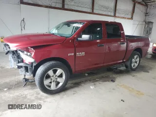 2014 Ram 1500 Express with VIN 1C6RR7KT9ES400557, listed as a Copart auction lot 61455445 with 118,909 mi miles and Salvage title. Bid and sale history available at DreamBid. Image 1.