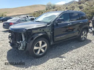 2015 Jeep Grand Cherokee Overland with VIN 1C4RJFCGXFC687897, listed as a Copart auction lot 62930695 with 91,208 mi miles and Salvage title. Bid and sale history available at DreamBid. Image 1.