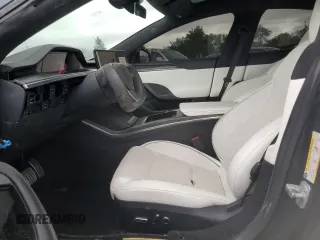 2023 Tesla Model S Plaid with VIN 5YJSA1E67PF511354, listed as a Copart auction lot 56648975 with 69,002 mi miles and Salvage title. Bid and sale history available at DreamBid. Image 7.