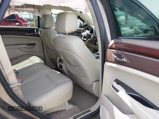2016 Cadillac SRX Performance Collection z VIN 3GYFNCE39GS512286, wystawiony jako IAAI lot #42392467 z przebiegiem 95 708 mil mil oraz . Historia ofert i sprzedaży dostępna na DreamBid. Obrazek 8.