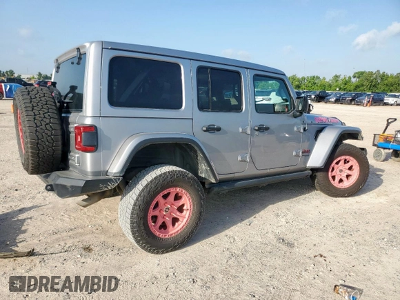 2021 Jeep Wrangler Unlimited Rubicon with VIN 1C4HJXFG0MW616829, listed as a Copart auction lot 61041425 with 128,724 mi miles and Salvage title. Bid and sale history available at DreamBid. Image 3.