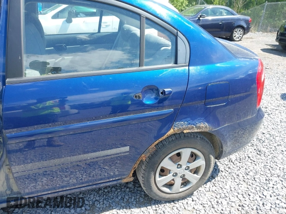 2010 Hyundai Accent GLS z VIN KMHCN4AC1AU433444, wystawiony jako IAAI lot #42356706 z przebiegiem 157 198 mil mil oraz . Historia ofert i sprzedaży dostępna na DreamBid. Obrazek 6.
