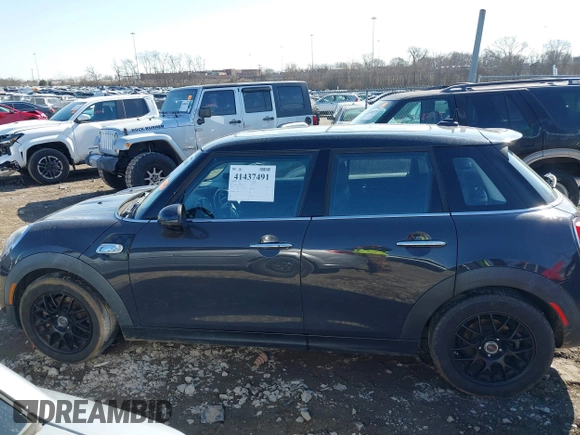 2015 MINI Hardtop 4 Door S with VIN WMWXU3C52F2B56517, listed as a IAAI auction lot 41437491 with 111,916 mi miles and . Bid and sale history available at DreamBid. Image 14.