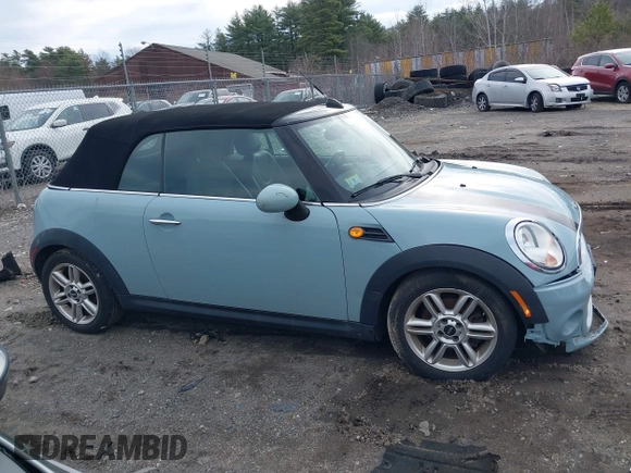 2013 MINI Convertible z VIN WMWZN3C53DT135427, wystawiony jako IAAI lot #41954817 z przebiegiem 57 029 mil mil oraz . Historia ofert i sprzedaży dostępna na DreamBid. Obrazek 14.