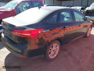 2018 Ford Focus SE with VIN 1FADP3F21JL259271, listed as a IAAI auction lot 41689494 with 94,190 mi miles. Bid and sale history available at carsss.com. Image 4.