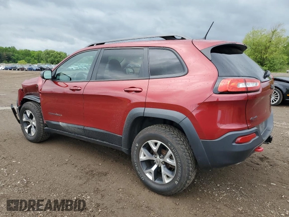 2014 Jeep Cherokee Trailhawk z VIN 1C4PJMBS2EW130125, wystawiony jako Copart lot #57830635 z przebiegiem 117 811 mil mil oraz Szkody całkowita. Historia ofert i sprzedaży dostępna na DreamBid. Obrazek 2.
