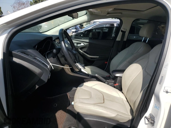 2017 Ford Focus Titanium with VIN 1FADP3J2XHL291606, listed as a Copart auction lot 58268285 with 153,272 mi miles and Salvage title. Bid and sale history available at DreamBid. Image 7.