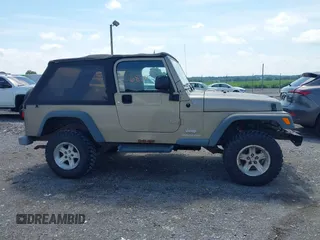 2004 Jeep Wrangler Sport with VIN 1J4FA49SX4P774167, listed as a IAAI auction lot 42686834 with 170,731 mi miles and . Bid and sale history available at DreamBid. Image 13.