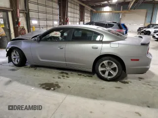 2013 Dodge Charger SE with VIN 2C3CDXBG4DH709332, listed as a Copart auction lot 48752605 with 135,287 mi miles and Salvage Title. Bid and sale history available at carsss.com. Image 2.