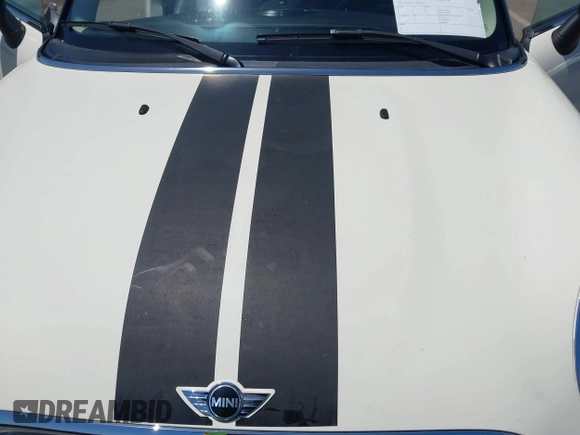 2013 MINI Hardtop z VIN WMWSU3C59DT544374, wystawiony jako IAAI lot #42302212 z przebiegiem 76 856 mil mil oraz . Historia ofert i sprzedaży dostępna na DreamBid. Obrazek 10.