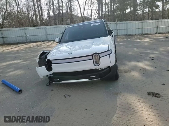 2023 Rivian R1S Adventure z VIN 7PDSGABA2PN013659, wystawiony jako Copart lot #53475945 z przebiegiem 13 928 mil mil oraz Szkody całkowita. Historia ofert i sprzedaży dostępna na DreamBid. Obrazek 11.