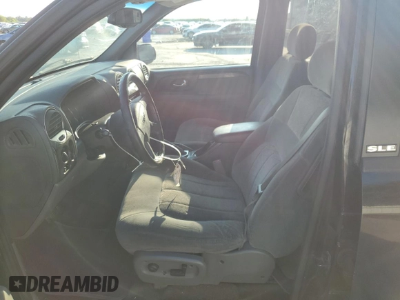 2003 GMC Envoy SLE with VIN 1GKDS13S232329083, listed as a Copart auction lot 73147534 with 212,645 mi miles and Salvage Title. Bid and sale history available at DreamBid. Image 7.