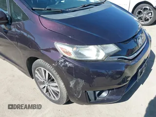 2015 Honda Fit EX-L z VIN 3HGGK5H80FM725959, wystawiony jako IAAI lot #42526513 z przebiegiem 110 885 mil mil oraz . Historia ofert i sprzedaży dostępna na DreamBid. Obrazek 6.