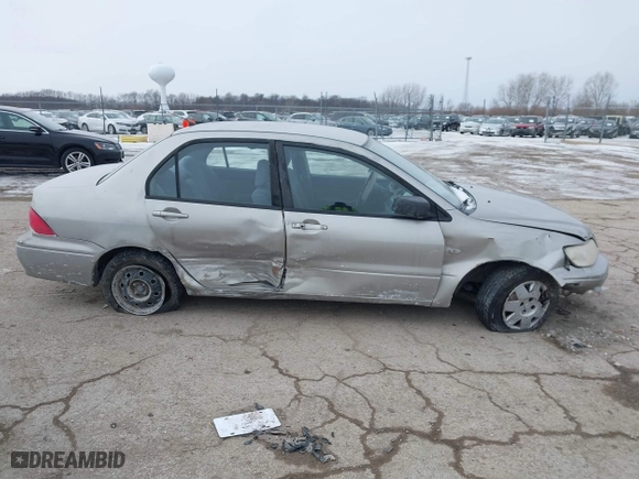 2002 Mitsubishi Lancer ES with VIN JA3AJ26E62U043039, listed as a IAAI auction lot 41600217 with 141,217 mi miles. Bid and sale history available at carsss.com. Image 13.