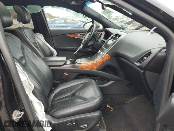 2019 Lincoln Nautilus Select z VIN 2LMPJ8K98KBL46353, wystawiony jako Copart lot #52502315 z przebiegiem 61 947 mil mil oraz Szkoda całkowita • Salvage title. Historia ofert i sprzedaży dostępna na DreamBid. Obrazek 7.