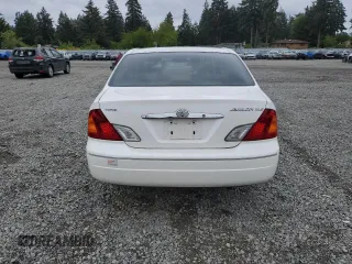 2001 Toyota Avalon XL z VIN 4T1BF28B31U136069, wystawiony jako Copart lot #57355025 z przebiegiem 217 489 mil mil oraz Szkody całkowita. Historia ofert i sprzedaży dostępna na DreamBid. Obrazek 6.