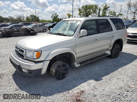 2000 Toyota 4Runner SR5 z VIN JT3HN86R3Y0277802, wystawiony jako Copart lot #60646825 z przebiegiem 215 251 mil mil oraz Czysty tytuł • Clean title. Historia ofert i sprzedaży dostępna na DreamBid. Obrazek 1.