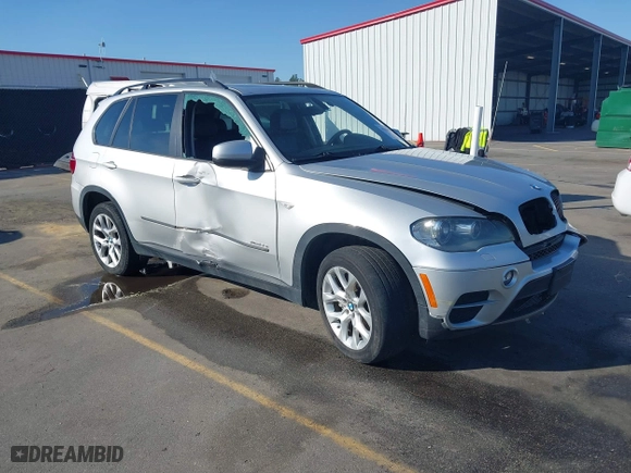 2011 BMW X5 35i with VIN 5UXZV4C5XBL412661, listed as a IAAI auction lot 41810470 with 168,470 mi miles. Bid and sale history available at carsss.com. Image 1.