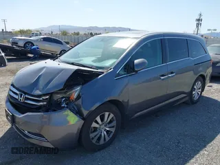2014 Honda Odyssey EX-L with VIN 5FNRL5H67EB096027, listed as a IAAI auction lot 41950398 with 147,158 mi miles and . Bid and sale history available at DreamBid. Image 2.
