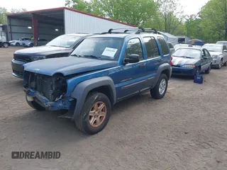 2003 Jeep Liberty Sport with VIN 1J4GL48K23W685486, listed as a IAAI auction lot 42094185 with 156,690 mi miles. Bid and sale history available at carsss.com. Image 2.