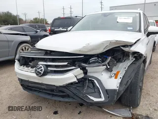 2023 Volkswagen Tiguan SE with VIN 3VVNB7AX8PM099759, listed as a IAAI auction lot 41340885 with 28,562 mi miles and . Bid and sale history available at DreamBid. Image 6.