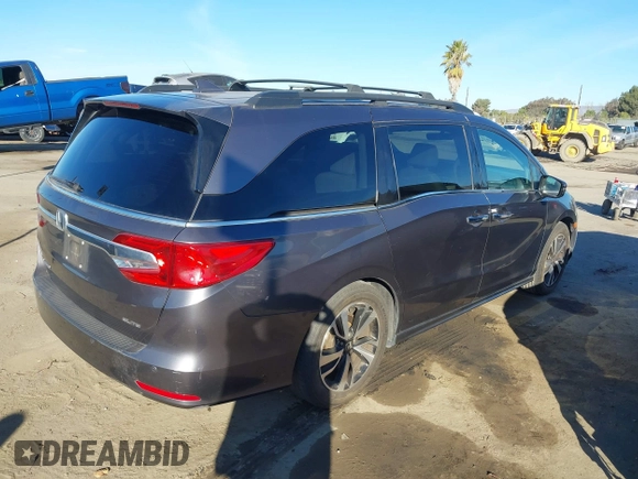 2018 Honda Odyssey Elite with VIN 5FNRL6H91JB052289, listed as a IAAI auction lot 41336068 with 94,685 mi miles and . Bid and sale history available at DreamBid. Image 4.