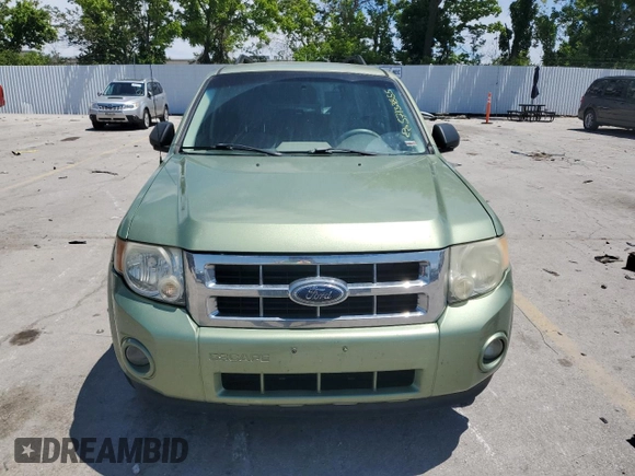 2008 Ford Escape XLT with VIN 1FMCU03158KC24575, listed as a Copart auction lot 57133855 with 200,329 mi miles and Salvage title. Bid and sale history available at DreamBid. Image 5.