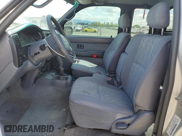 2000 Toyota Tacoma with VIN 5TEWN72N8YZ717707, listed as a Copart auction lot 54479455 with 197,407 mi miles and Salvage title. Bid and sale history available at DreamBid. Image 7.