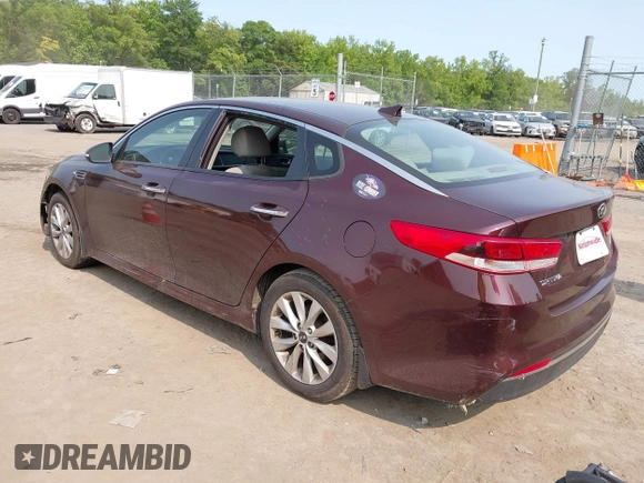 2018 Kia Optima LX z VIN 5XXGT4L30JG268095, wystawiony jako IAAI lot #42411812 z przebiegiem 119 150 mil mil oraz . Historia ofert i sprzedaży dostępna na DreamBid. Obrazek 3.