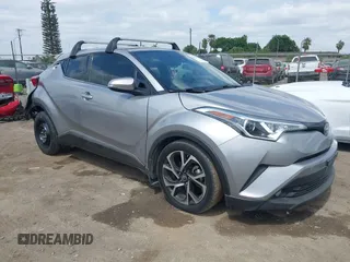 2019 Toyota C-HR XLE with VIN JTNKHMBX3K1016723, listed as a IAAI auction lot 42040571 with 158,804 mi miles. Bid and sale history available at carsss.com. Image 13.