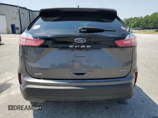 2021 Ford Edge SE with VIN 2FMPK4G99MBA58726, listed as a Copart auction lot 56795185 with 80,360 mi miles and Salvage title. Bid and sale history available at DreamBid. Image 6.