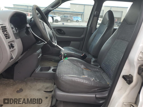 2001 Ford Escape XLS with VIN 1FMYU02161KB01283, listed as a Copart auction lot 59145105 with 86,195 mi miles and Salvage title. Bid and sale history available at DreamBid. Image 7.