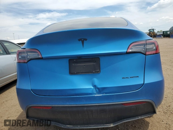 2021 Tesla Model Y Long Range z VIN 5YJYGDEE6MF239571, wystawiony jako Copart lot #56433595 z przebiegiem 58 471 mil mil oraz Szkoda całkowita • Salvage title. Historia ofert i sprzedaży dostępna na DreamBid. Obrazek 6.