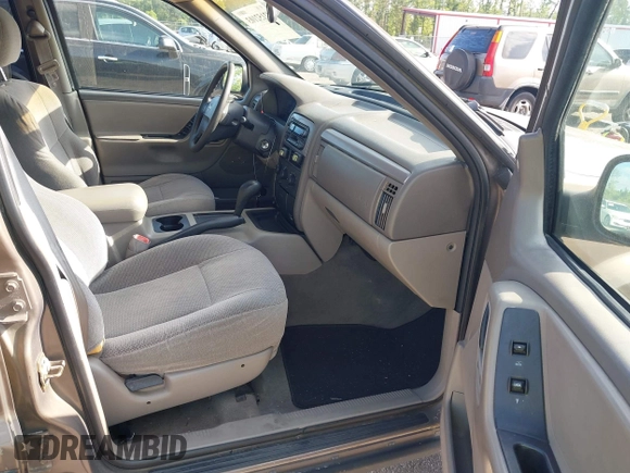 2001 Jeep Grand Cherokee Laredo with VIN 1J4GX48S91C559693, listed as a IAAI auction lot 42152103 with 152,713 mi miles and . Bid and sale history available at DreamBid. Image 5.