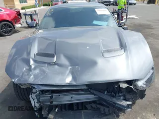 2021 Ford Mustang GT z VIN 1FA6P8CF0M5104894, wystawiony jako IAAI lot #41903098 z przebiegiem 38 794 mil mil oraz . Historia ofert i sprzedaży dostępna na DreamBid. Obrazek 13.