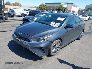 2024 Kia Forte GT-Line with VIN 3KPF54AD4RE803242, listed as a IAAI auction lot 41826518 with 5,099 mi miles. Bid and sale history available at carsss.com. Image 2.