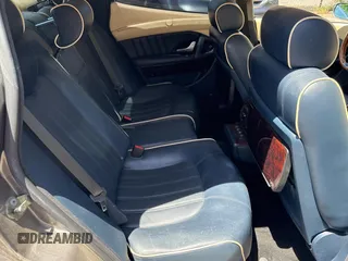 2006 Maserati Quattroporte z VIN ZAMCE39A960021168, wystawiony jako Copart lot #56921785 z przebiegiem 54 505 mil mil oraz Tytuł czysty. Historia ofert i sprzedaży dostępna na DreamBid. Obrazek 6.