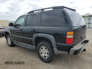 2003 Chevrolet Tahoe Z71 z VIN 1GNEK13Z13R301464, wystawiony jako Copart lot #53905395 z przebiegiem 165 360 mil mil oraz Szkoda całkowita • Salvage title. Historia ofert i sprzedaży dostępna na DreamBid. Obrazek 2.