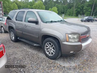 2011 Chevrolet Tahoe LT z VIN 1GNSCBE08BR163408, wystawiony jako IAAI lot #42345398 z przebiegiem 283 718 mil mil oraz . Historia ofert i sprzedaży dostępna na DreamBid. Obrazek 1.
