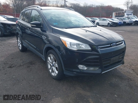2014 Ford Escape Titanium with VIN 1FMCU9J98EUD73818, listed as a IAAI auction lot 42036442 with 129,794 mi miles. Bid and sale history available at carsss.com. Image 6.