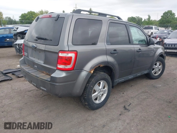2012 Ford Escape XLT with VIN 1FMCU0D70CKB57640, listed as a IAAI auction lot 42364980 with 122,652 mi miles and . Bid and sale history available at DreamBid. Image 4.