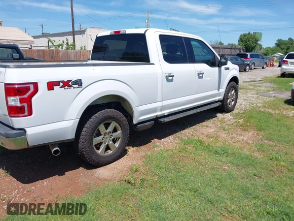 2018 Ford F-150 XL with VIN 1FTFW1E5XJKE02519, listed as a IAAI auction lot 42180274 with 184,101 mi miles. Bid and sale history available at carsss.com. Image 4.