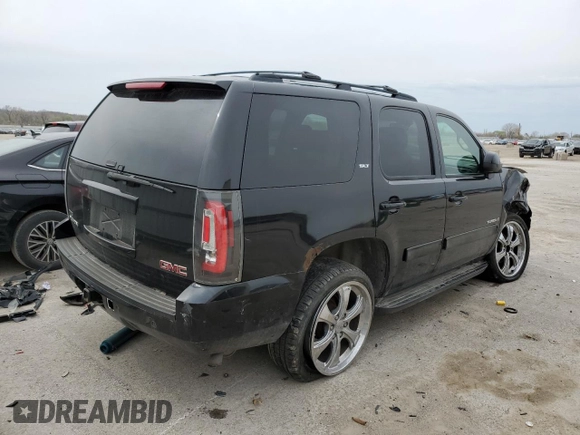 2009 GMC Yukon SLT 4SB with VIN 1GKFK33009R280856, listed as a Copart auction lot 51522635 with 265,941 mi miles and Salvage Title. Bid and sale history available at DreamBid. Image 3.