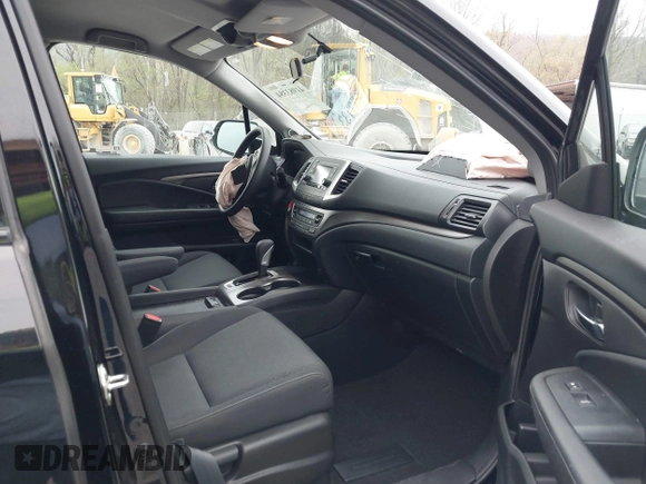 2019 Honda Ridgeline Sport with VIN 5FPYK3F10KB046552, listed as a IAAI auction lot 41983384 with 77,229 mi miles and . Bid and sale history available at DreamBid. Image 5.