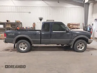 2000 Ford Ranger XLT with VIN 1FTZR15X2YPB86720, listed as a IAAI auction lot 41501141 with 211,794 mi miles. Bid and sale history available at carsss.com. Image 13.