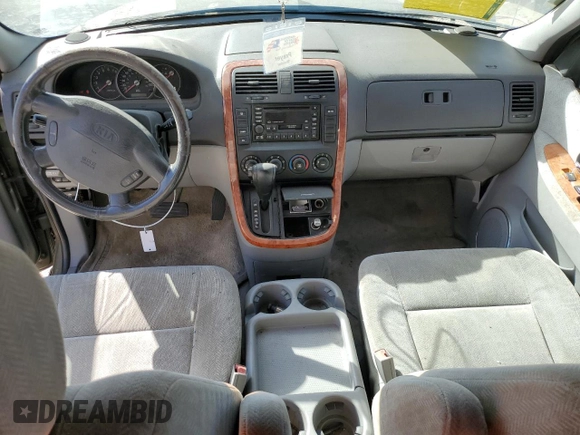 2005 Kia Sedona LX with VIN KNDUP132856716343, listed as a Copart auction lot 76028804 with 122,914 mi miles and Salvage Title. Bid and sale history available at carsss.com. Image 8.