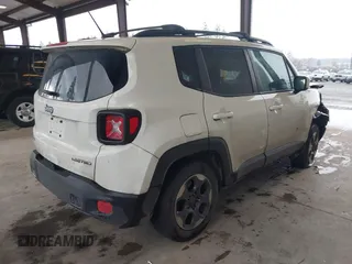 2015 Jeep Renegade Latitude with VIN ZACCJBBH7FPB51994, listed as a IAAI auction lot 41658051 with 95,580 mi miles. Bid and sale history available at carsss.com. Image 4.